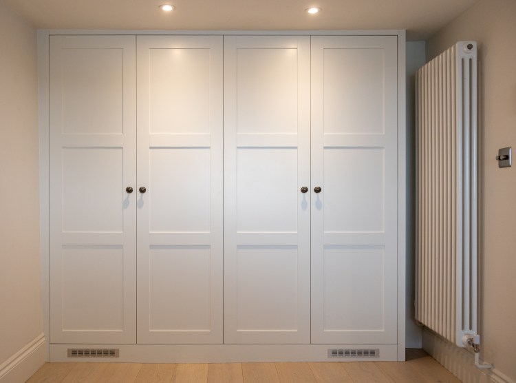 bespoke cabinet built in fitted wardrobe cornwall carpentry joinery storage charlestown shaker door bedroom furniture