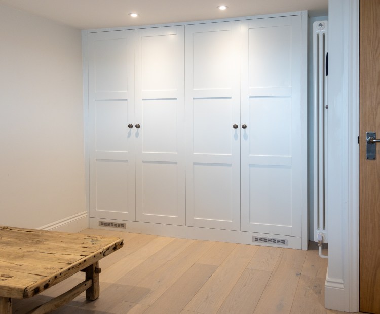 bespoke cabinet built in fitted wardrobe cornwall carpentry joinery storage charlestown shaker door bedroom furniture