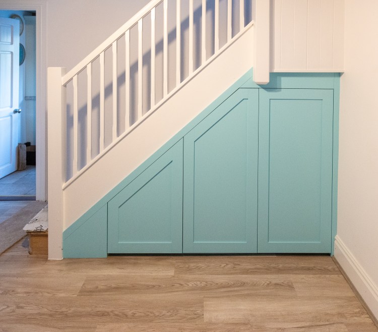 Understair storage under stair pull out drawer shaker door